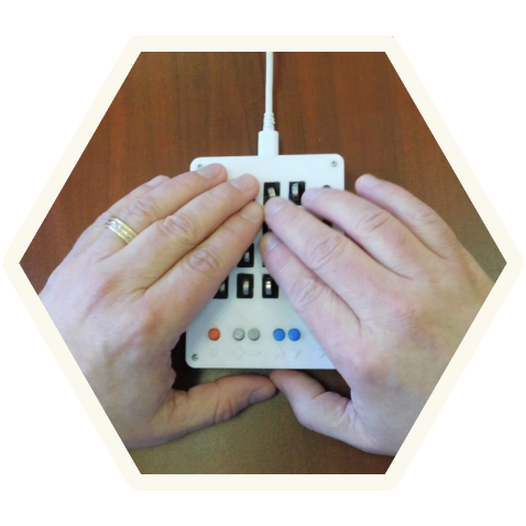 Photo of a visually impaired person using the Tomat Navigator